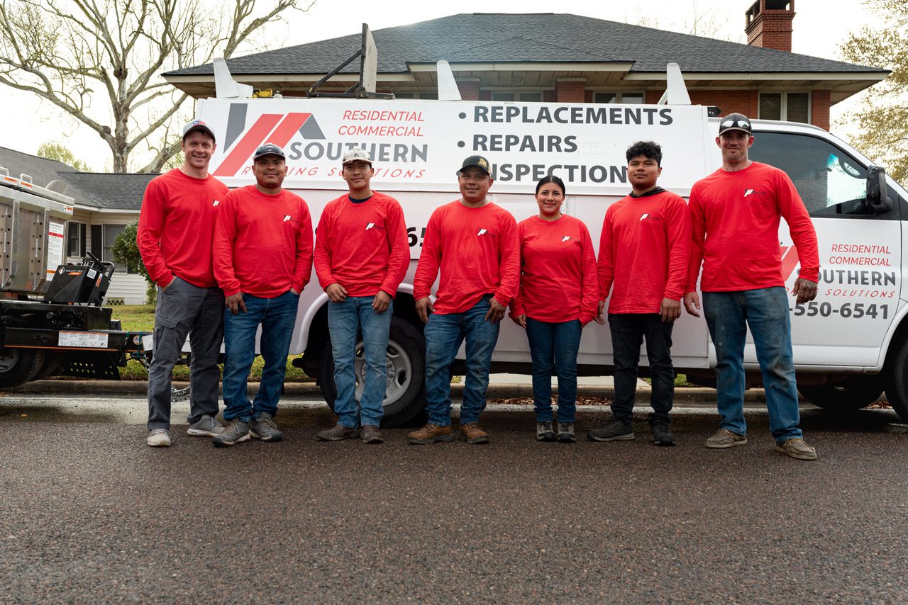 Southern Roofing Solutions in-house crew standing in front of branded service van in Silsbee, TX.